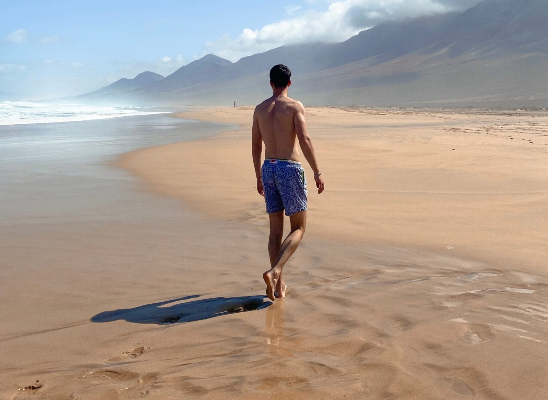 reise-blau-gay-urlaub-fuerteventura-beach-boy-lgbtqia+